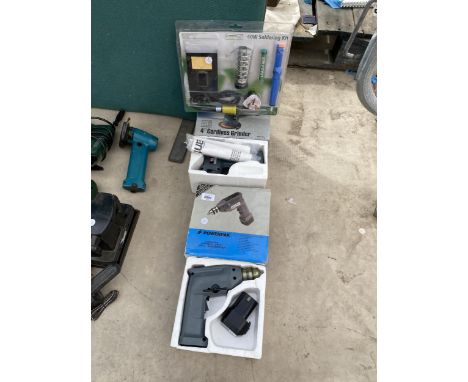 THREE BOXED POWER TOOLS TO INCLUDE A CORDLESS DRILL AND GRINDER AND A 40W SOLDERING KIT 