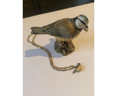 AN HIDDEN TREASURES HAND PAINTED BLUE TIT ON A BRANCH TRINKET BOX EMBELLISHED WITH CRYSTALS AND CONCEALING A MATCHING PENDANT