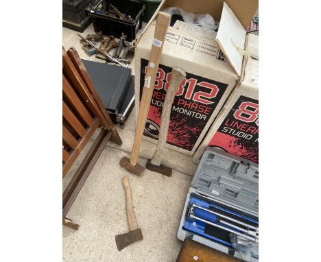 THREE HAND TOOLS TO INCLUDE TWO AXES AND A SLEDGE HAMMER 