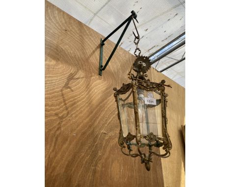 A VINTAGE GILT OUTDOOR HANGING LANTERN 