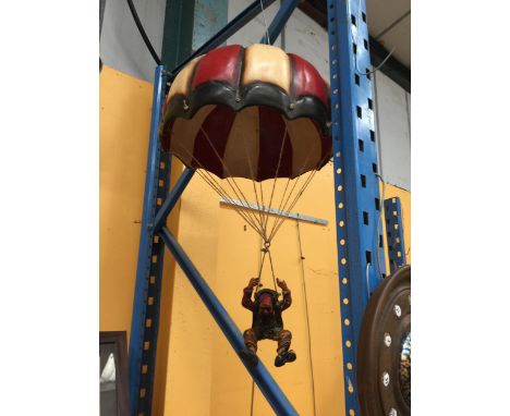 A VINTAGE WOODEN PARACHUTING CLOWN FIGURE 