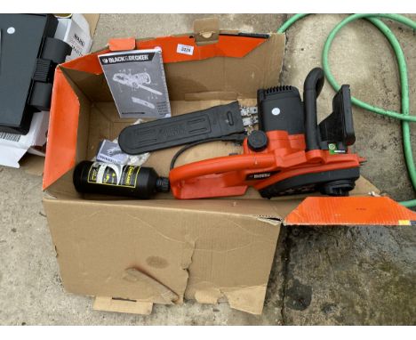 A BOXED ELECTRIC BLACK AND DECKER CHAINSAW 