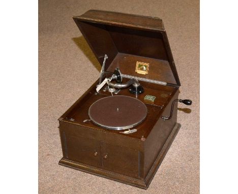 Vintage His Masters Voice ‘model 103’ gramophone, fitted two doors enclosing racks, 39×46×33cms high.