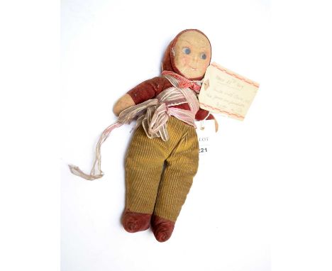 A Norah Wellings type pixie cloth doll, with later parcel ribbon and tag fashioned as a sash, the note reads; "Handle with ca