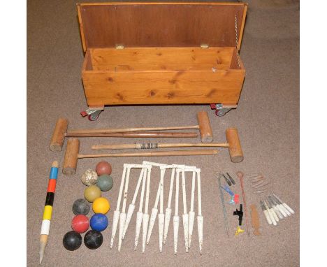 Vintage croquet items, including: six cast-iron croquet hoops by Davidson, Pat no 26994; c1898; together with a Jaques style 