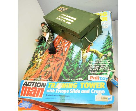 A Palitoy Action Man Training Tower, with escape slide and crane, in box; together with an Action Man Figure; and an Action M