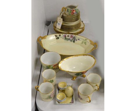 A selection of 1920s hand-painted tea and table wares, including: a twin-handled serving dish, painted with flowers and bramb