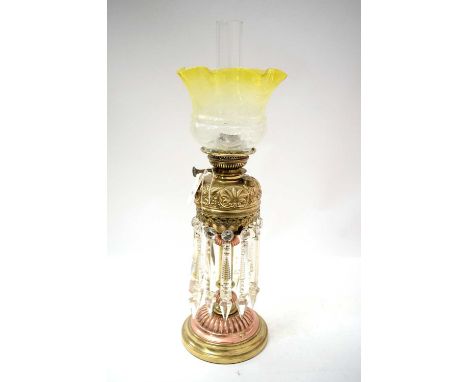 A Victorian copper and brass oil lamp, with crystal lustre drop detail, ombré yellow glass shade and clear glass funnel, 70cm