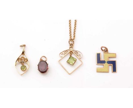 Four early 20th Century gold pendants: one swastika design with yellow and blue enamel, stamped 9ct; two peridot pendants, on
