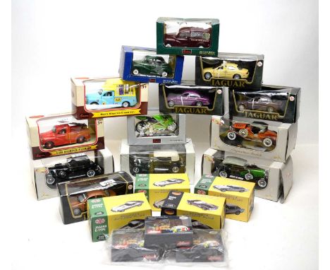 A selection of die-cast model vehicles, including: four various Classic Sports Cars cars; three Schuco limited edition London