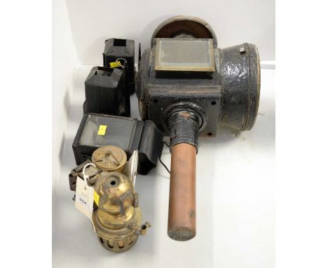 A black painted metal railway signal or carriage lamp; together with other lamps and parts.