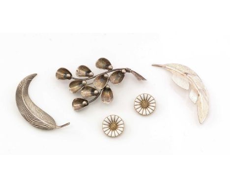Niels Erik From Danish silver brooch, of stylized floral design; two modern silver feather brooches, one by David Andersen; a