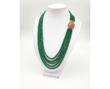 395cts Five-Row Emerald Necklace with Ruby and Sapphire Clasp. With a halo of Rose Cut Diamonds.48cm 