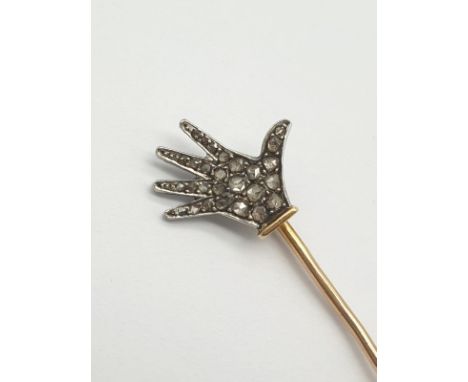 An 18K Yellow Gold Stick Pin with Encrusted Diamond Hand Attachment. 6cm. 1.69g 