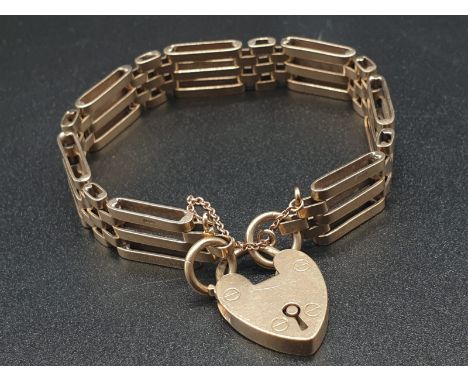 9K Yellow Gold Ladder-Link Bracelet with Heart Charm.16cm. 21.84g 