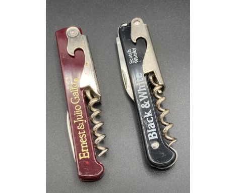 Two vintage 1960s/70s promotional knives, black-and-white scotch whisky and Ernest and Julio Gallo. 