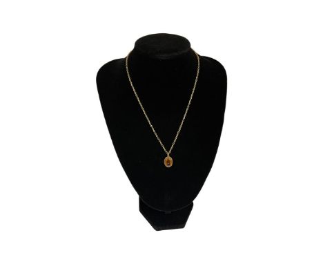 Vintage 9ct gold and citrine  pendant on yellow metal chain. weight 5.6g 