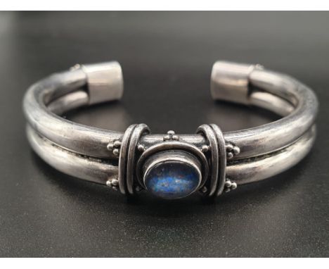 Vintage Silver Bangle with Blue Opal. 6cm diameter.28.86g 