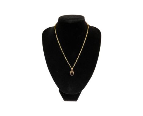 Vintage 9ct gold and gemstone pendant, on yellow metal chain, 5.3g weight 