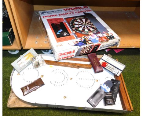 A mid-century Bagatelle board game, a darts set, including score board  with a quantity of boxed darts.