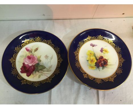 Two Royal Worcester Badsey show plates, 1925, one painted with roses, the other with pansies, the blue bude painted with "gol