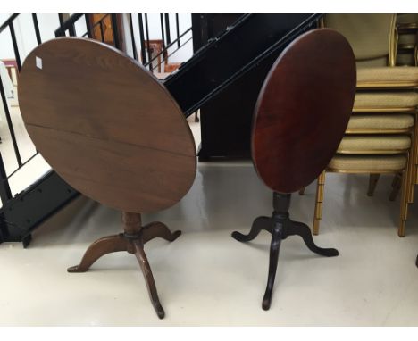 A 19th century oak table on tripod base