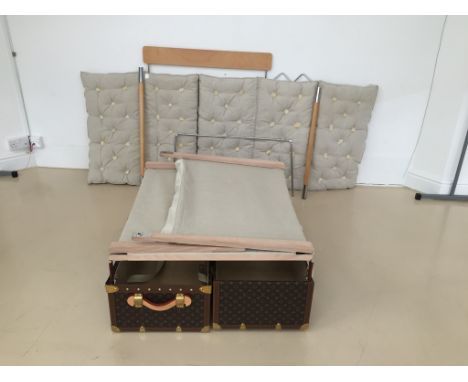 A Unique Louis Vuitton "Explorators" Camp Bed In Trunk:After the original Louis Vuitton bed made in 1905 with zinc cover, thi