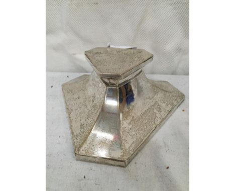 A triangular-shaped silver inkwell by Goldsmith & Silversmith Co