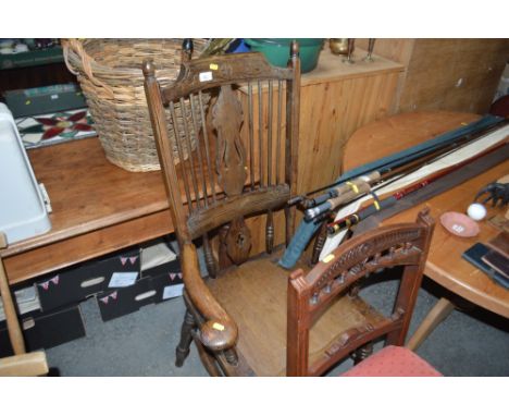 A stick back arm chair
