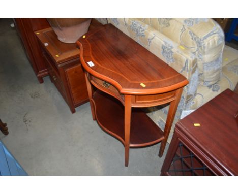 A reproduction hall table fitted two drawers