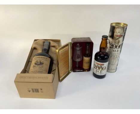 An unopened 1 litre bottle of Glenmorangie Scotch whisky, a bottle of 2000 Gains ale and a Glenmorangie whisky and glass set