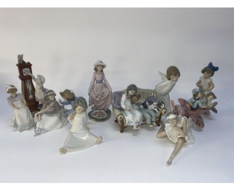 Ten Spanish porcelain figural studies by Lladro and Nao, to include 'Don't Look Down' and 'Bedtime', the largest measures 27c