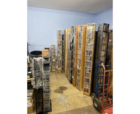 Twenty plus CD towers and CDs, mixed genres, artists including Johnny Cash, Bob Dylan, Frank Sinatra, The Beatles and others