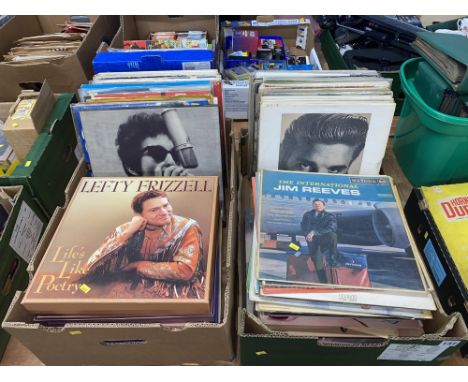 Two boxes of LPs and records of mixed genres to include Elvis Presley, Bob Dylan, Tommy Collins, Jim Reeves and Marvin Rainwa