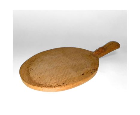 A Robert 'Mouseman' Thompson of Kilburn, North Yorkshire cheese board, the handle with carved mouse motif, 36cm L