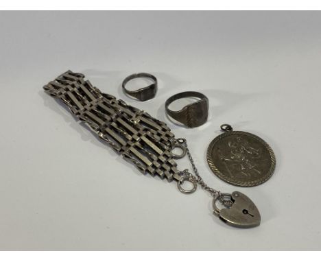 Two silver stamped signet rings, a gate link bracelet with padlock pendant and a St. Christopher pendant