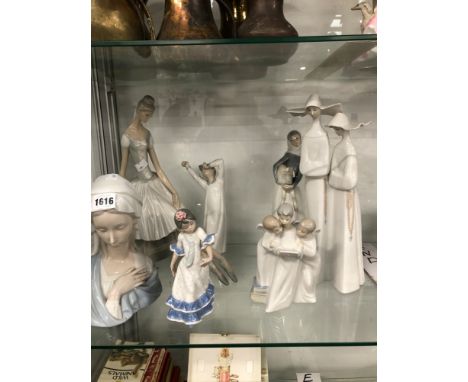 SEVEN LLADRO AND NAO FIGURINES TOGETHER WITH A ROYAL COPENHAGEN GREAT DANE  