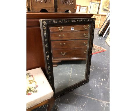 AN ANTIQUE RECTANGULAR MIRROR IN A CHINESE BLACK LACQUER FRAME INLAID WITH MOTHER OF PEARL FLOWERS AND BUTTERFLIES.   84 x 58