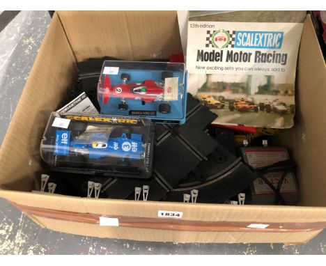 A COLLECTION OF SCALEXTRIC 
