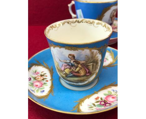 A SET OF FOUR 19th C. SEVRES TURQUOISE GROUND CUPS AND SAUCERS PAINTED WITH COUPLES IN LANDSCAPES AND WITH FLOWERS TOGETHER W