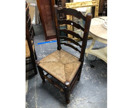 A SET OF FOUR ANTIQUE LADDER BACK RUSH SEAT CHAIRS 