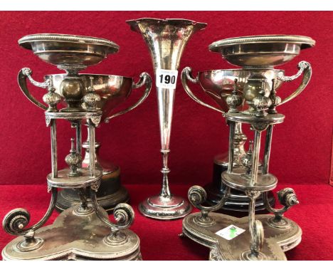 TWO SIMILAR TWO HANDLED TROPHY CUPS AND STANDS BY ELKINGTONS, BIRMINGHAM 1926 AND 1928, A SHERRY BOTTLE LABEL, 433Gms, A SPEC