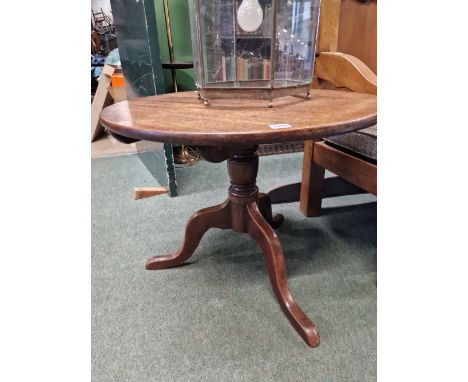 A MAHOGANY TRIPOD COFFEE TABLE TOGETHER WITH ANOTHER CIRCULAR TABLE SUPPORTED ON A COLUMN AND TRIPARTITE BASE