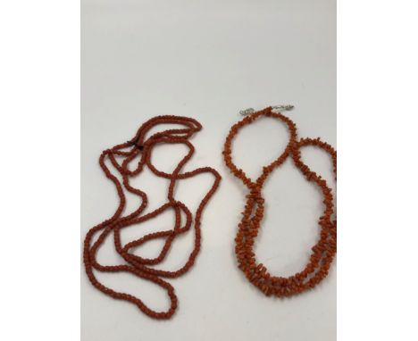 AN ANTIQUE CONTINUOUS ROW OF CORAL BEADS, APPROXIMATE DIAMETER 3.6mm, LENGTH 128cms, TOGETHER WITH A STICK CORAL VINTAGE NECK