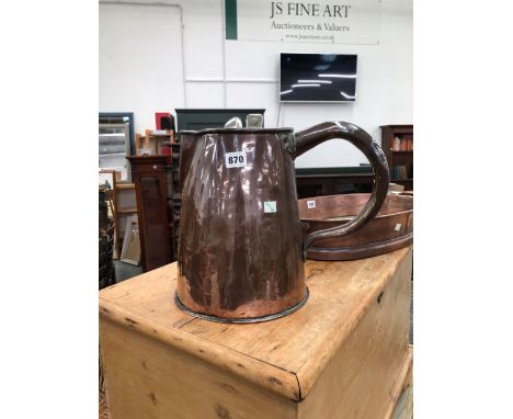 A 19th C. COPPER JUG WITH A BRAZED SEAM BY THE RIVETTED HANDLE.   H 29cms. TOGETHER WITH A PAIR OF FIDDLE PATTERN ELECTROPLAT