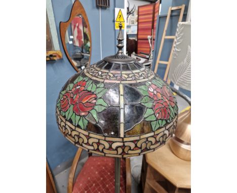 A TIFFANY STYLE STANDARD LAMP WITH LEADED GLASS SHADE