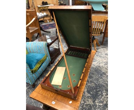 A SMALL ANTIQUE MAHOGANY FOLDING BAGATELLE BOARD. GREEN BAIZE LINED WITH BOXWOOD "POCKETS".