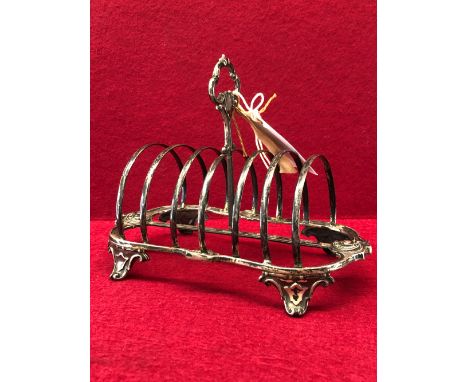 A SILVER SEVEN BAR TOASTRACK BY HENRY WILKINSON &amp; CO, SHEFFIELD 1877, 284Gms.