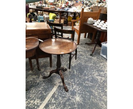 A 19th C. MAOGANY TRIPOD TABLE WITH A DISHED CIRCULAR TOP ON A BALUSTER COLUMN, THE LEGS WITH LONG NOSED CLUB FEET.   Dia. 53
