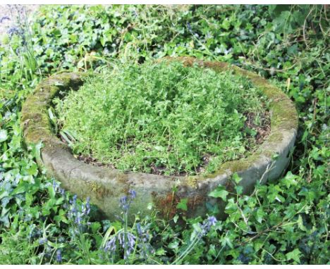 * A circular sandstone trough, 30cm H x 90cm D 